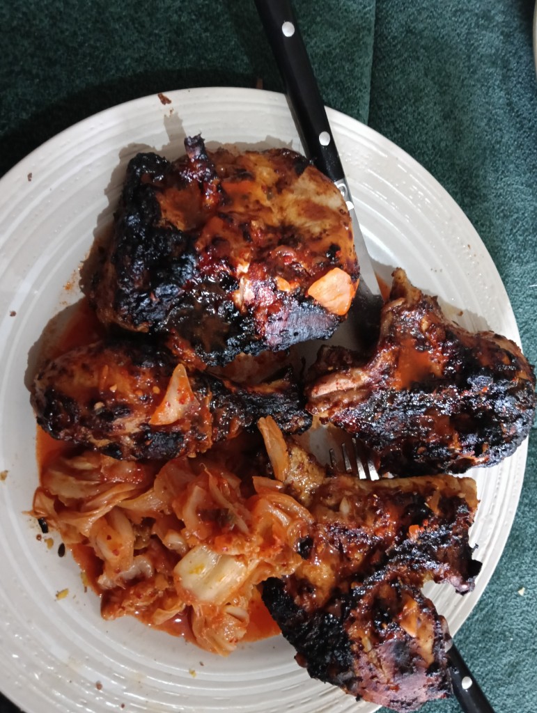 Damo's Charcoal Asian BBQ Chicken with kimchi on a white plate — air fryer receipt photo